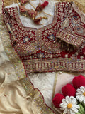 Ivory Rangoli Silk Saree with Embroidered Wine Blouse