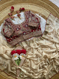 Ivory Rangoli Silk Saree with Embroidered Wine Blouse