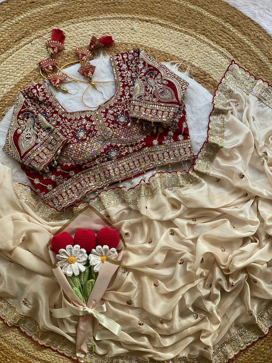 Ivory Rangoli Silk Saree with Embroidered Wine Blouse