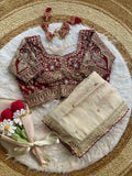 Ivory Rangoli Silk Saree with Embroidered Wine Blouse